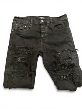AMIRI Black Ripped Denim Jeans with Studded Panels